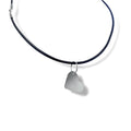 Heart-shaped pendant with leather cord