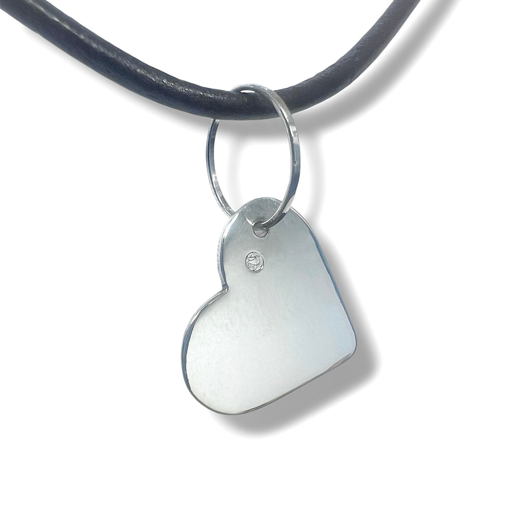 Heart-shaped pendant with leather cord